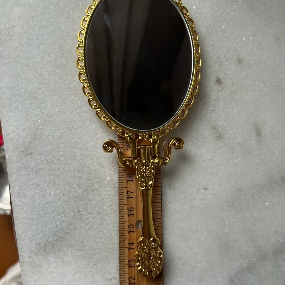 Izzy and Liv gold Fold Away Hand Mirror adjustable